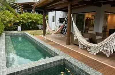 Casa à venda na praia do forte com 3 suítes e piscina privativa.