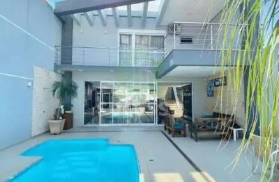 Sobrado no tropical alto padrão semi mobiliado com piscina aquecida