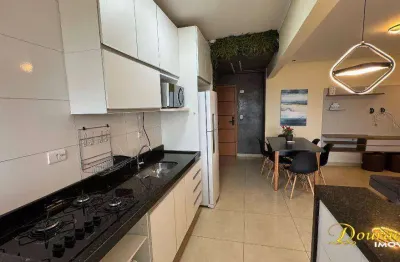 Apto de 2 dormitórios sendo 1 suíte, mobiliado, vista mar, maracanã em praia grande sp.