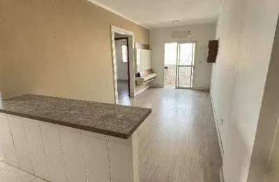 Apartamento de 2 dormitórios, sendo 1 suíte com  sacada na guilhermina em praia grande sp.