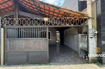 Casa geminada de 3 dormitórios sendo 1 suíte,2 vagas,  na Guilhermina em Praia Grande SP.