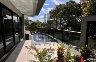 Casa de alto padrão em porto belo/sc com área privativa de 200m² e 348m² de terreno. 3 suítes e piscina com cascata!