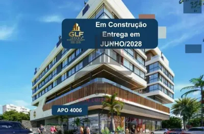 Apto em construção em bombinhas/sc com 80m²área privativa, sendo 2 suítes, 2 vagas de garagem, área de lazer completa