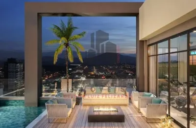 Apartamento lançamento alto padrão na cidade de porto belo/sc no bairro balneário perequê 2 suítes e 2 vagas de garagem. localização privilegiada
