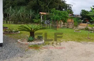 Chácara a venda na cidade de canelinha/sc no bairro moura, com 3.200 m². chácara completa com lavoura, árvores frutíferas, criação de aves e muito mai