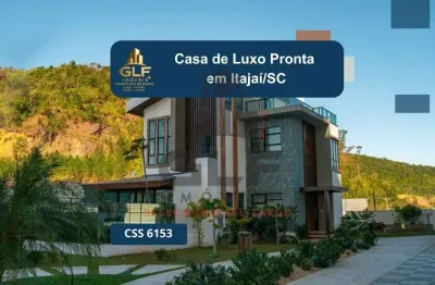 Casa de luxo na cidade de itajaí/sc, no bairro ressacada, com 3 suítes e 4 vagas de garagem.  localização privilegiada. casa alto padrão