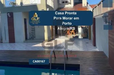 Casa pronta para morar em porto alegre/rs com 300m² área privativa sendo 4 dormitórios, 2 vagas de garagem, bem localizada