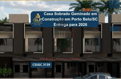 Casa sobrado geminado a venda na cidade de porto belo/sc, no bairro jardim dourado. casa com 2 suítes e 2 vagas de garagem. bem localizado