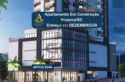 Apto em Construção em Itapema/SC bairro Tabuleiro, com 70m² área privativa, com 2 dormitórios sendo 1 suíte, 1vaga de garagem,  área de lazer completa