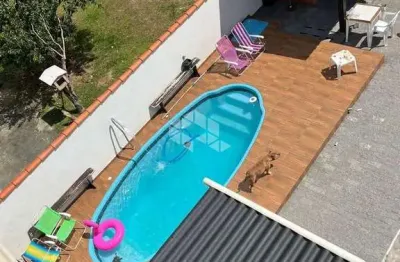 Casa a venda na praia da pinheira com  3 dormitórios sendo 1 suíte  à venda por r$ 1.050.000,00.