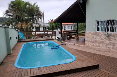 Casa com 4 dormitórios/ quartos sendo 1 suíte em são josé sc, bairro potecas à venda por r$ 890.400,00.