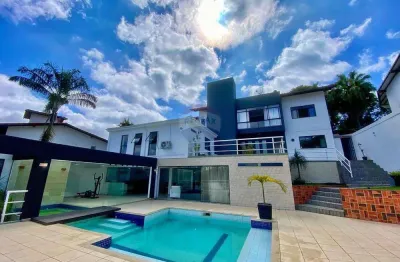 Casa com elevador e 4 quartos no  condomínio parque imperial
