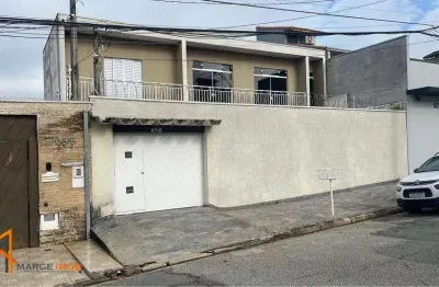 Casa com 3 dormitórios à venda, 140 m² por R$ 650.000 - Vila Lavínia - Mogi das Cruzes/SP