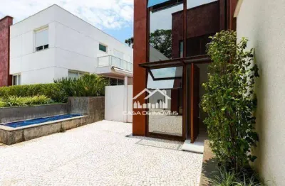 Vende casa de alto padrão em condomínio com 4 suítes e 8 vagas no campo belo.