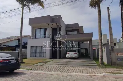Luxo e conforto em itapoá/sc: sobrado no condomínio south beach com piscina e 4 suítes