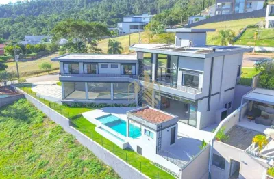 Casa com 4 dormitórios à venda, 442 m² por r$ 5.299.000,00 - condominio porto atibaia - atibaia/sp
