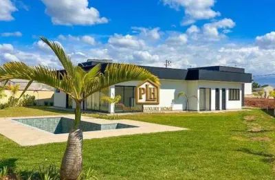 Casa térrea com 4 suites à venda no condomínio shambala iii em atibaia