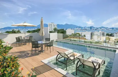 Studio com rooftop e vista para a baía de guanabara com vista para o mar,
