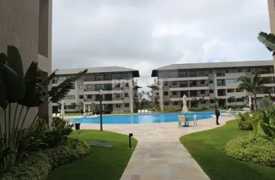 Apartamento mobiliado 2 quartos, 1 suíte em condomínio beira mar
