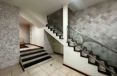 Casa com 4 suítes à venda, 404 m² por R$ 1.400.000 - Centro - Varginha/MG