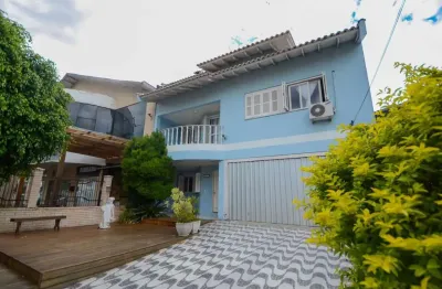 Sobrado com 5 quartos e 3 suítes no bairro barnabé em gravataí com amplo terreno