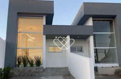 Casa moderna com suíte, churrasqueira e design sofisticado no bairro planejado