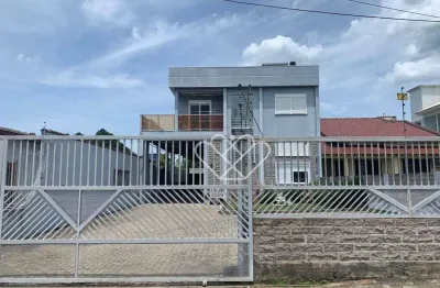 Residência Exclusiva de Três Pisos: Seu Novo Lar de Conforto e Elegância