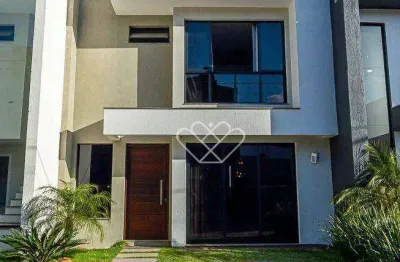 Casa de dois andares à venda e para locação no Residencial Primavera em Gravataí com 120m² privativos