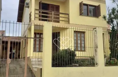 Casa de dois andares no condomínio Jardim Timbaúva, Gravataí