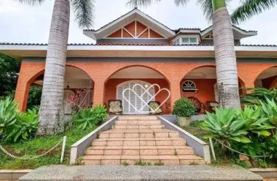 Casa luxuosa com 4 suítes e churrasqueira no bairro paragem dos verdes campos