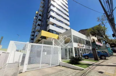 Apartamento com 1 dormitório para alugar, 55 m² - Centro - Gravataí/RS