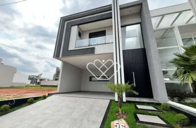 Casa em condomínio de alto padrão com 3 dormitórios, suíte e lareira - seu novo lar espera por você