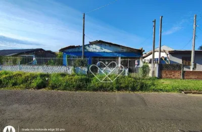 Terreno amplo com construção e área gourmet no bairro em Gravataí