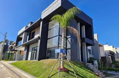 Casa de esquina com 3 suítes em condomínio no bairro jansen – exclusividade e conforto em gravataí