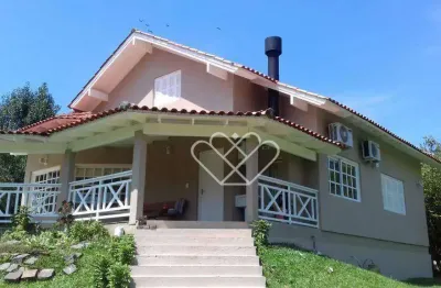 Casa mobiliada à venda no Paragem dos Verdes Campos com amplo terreno e suíte