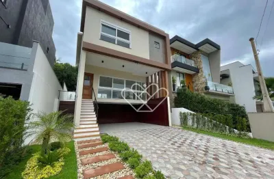 Casa com 3 suítes à venda no Centro de Gravataí — alto padrão, área ampla e vista para a mata