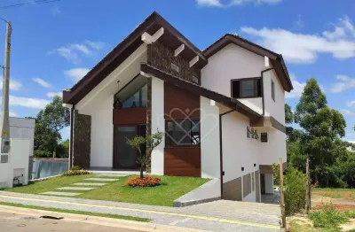 Casa estilo serra com 3 dormitórios à venda em condomínio exclusivo no centro de gravataí