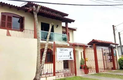 Casa espaçosa com 4 dormitórios no bairro salgado filho