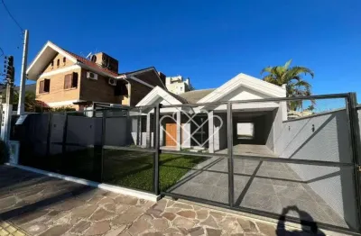 Casa com 2 suítes no bairro Dom Feliciano em Gravataí disponível para venda e locação