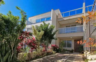 Casa em condomínio fechado com 3 quartos à venda na Rua Heitor Kramer, Guarujá, Porto Alegre