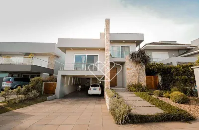 Casa de alto padrão no Residencial Alphaville em Gravataí com 3 suítes e piscina