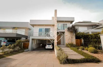 Casa de alto padrão no Residencial Alphaville em Gravataí com 3 suítes e piscina