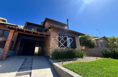 Casa à venda no bairro Renascença em Gravataí com piscina e ótima área construída