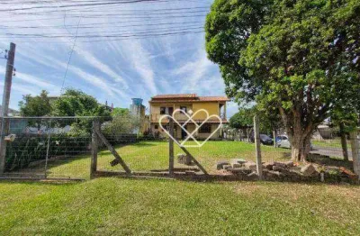 Casa de esquina com pátio amplo à venda no bairro santa fé, em gravataí