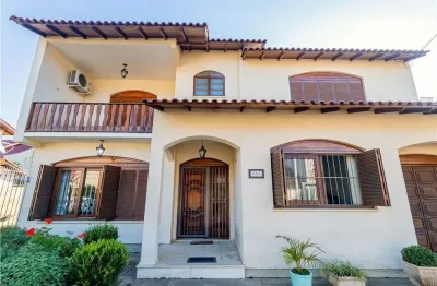 Casa em condomínio fechado com 4 quartos à venda na Rua Paulo Blaschke, Jardim Itu Sabará, Porto Alegre