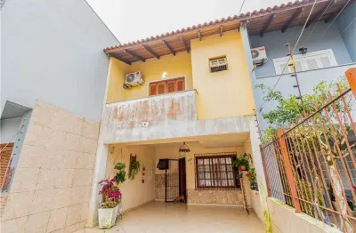 Casa em condomínio fechado à venda na Rua Moacyr Godoy Ilha, Guarujá, Porto Alegre