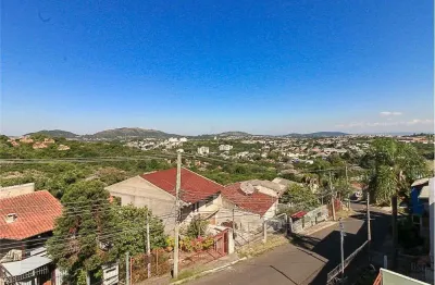 Casa em condomínio fechado com 3 quartos à venda na Rua Ângelo Passuelo, Vila Nova, Porto Alegre