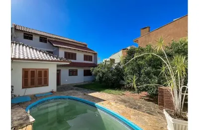 Casa em condomínio fechado com 4 quartos à venda na Avenida Açucena, Estância Velha, Canoas
