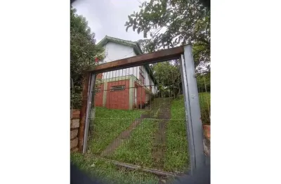 Casa em condomínio fechado com 3 quartos à venda na Avenida Joracy Camargo, Santa Tereza, Porto Alegre