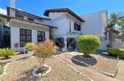 Casa à venda no bairro camaquã, em porto alegre – ampla, aconchegante e bem localizada